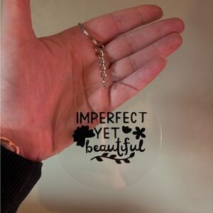 “Imperfect Yet Beautiful” Clear Keychain with Black Text